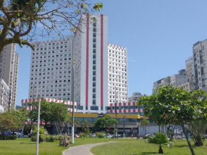 Apto em Santos, Condomínio Frente ao Mar, Garagem, Internet 250MB, Wifi e Netflix Grátis, Smart TV, 1 Dorm